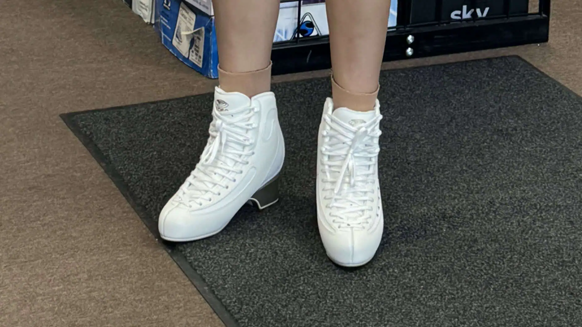 White figure skating boots without blades